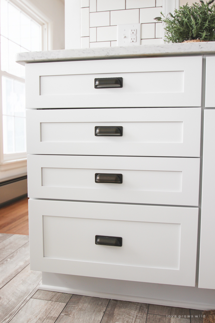 Follow along the makeover of this beautiful farmhouse kitchen! In this post, Liz shares the cabinets and hardware she used. Click for more photos and details!