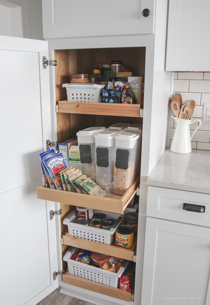 Follow along the makeover of this beautiful farmhouse kitchen! In this post, Liz shares the cabinets and hardware she used. Click for more photos and details!