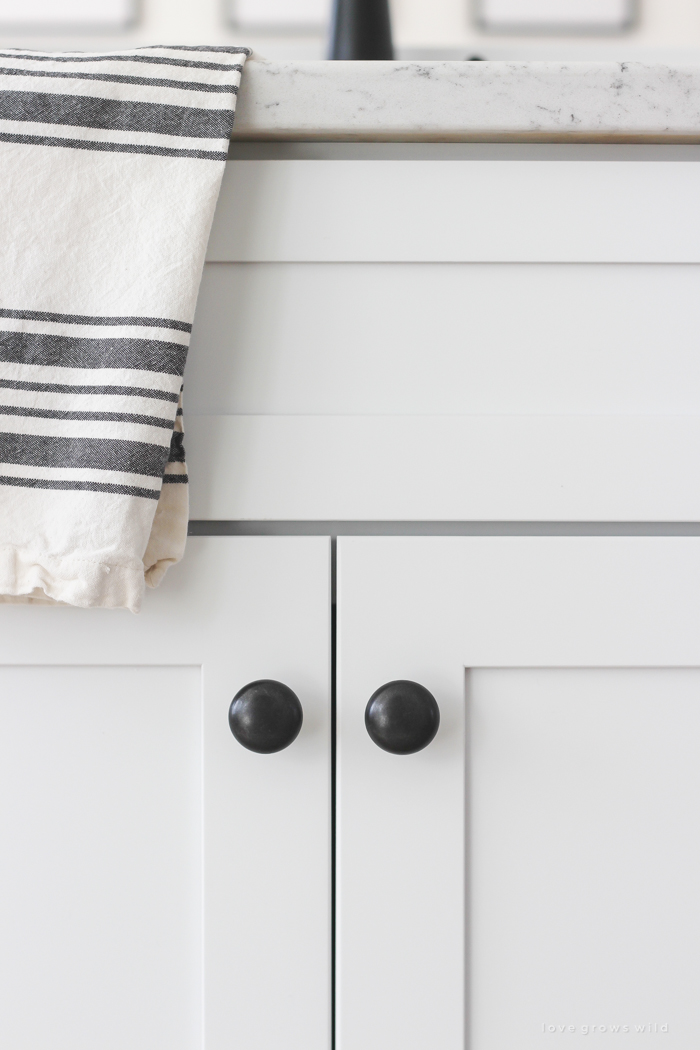 Follow along the makeover of this beautiful farmhouse kitchen! In this post, Liz shares the cabinets and hardware she used. Click for more photos and details!