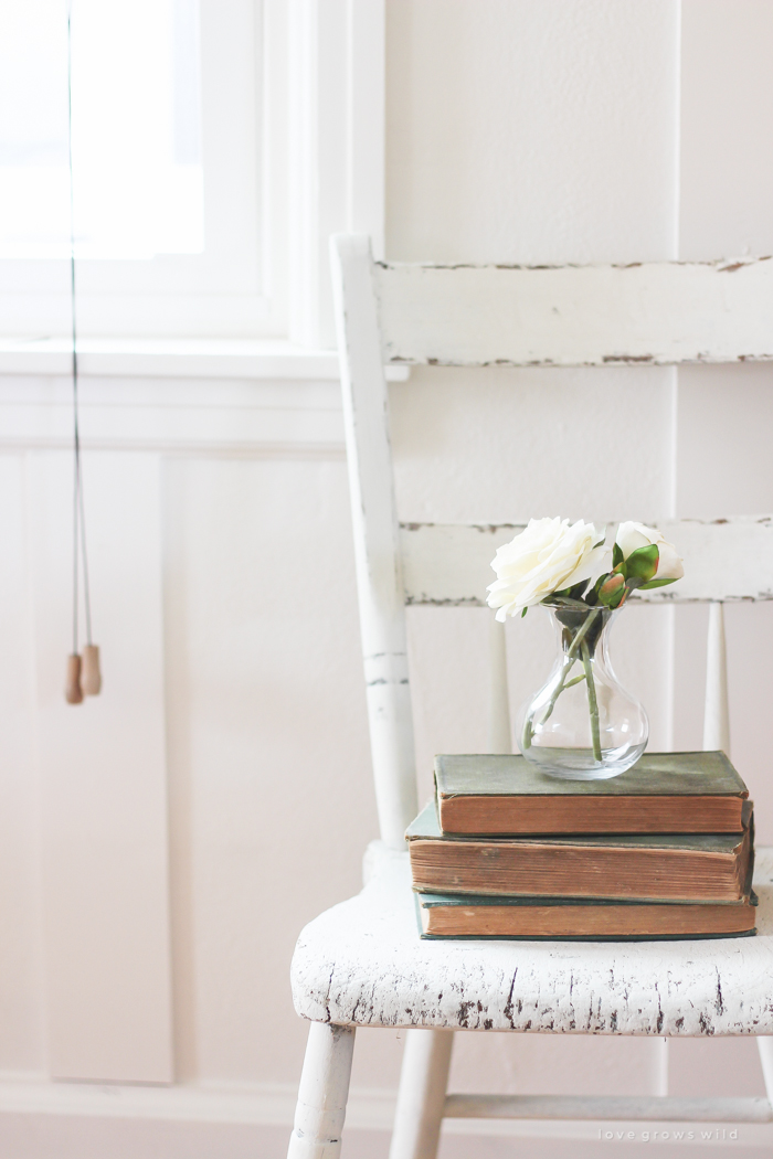 A gorgeous antique armoire decorated for spring in a lovely, little farmhouse. See more photos at LoveGrowsWild.com