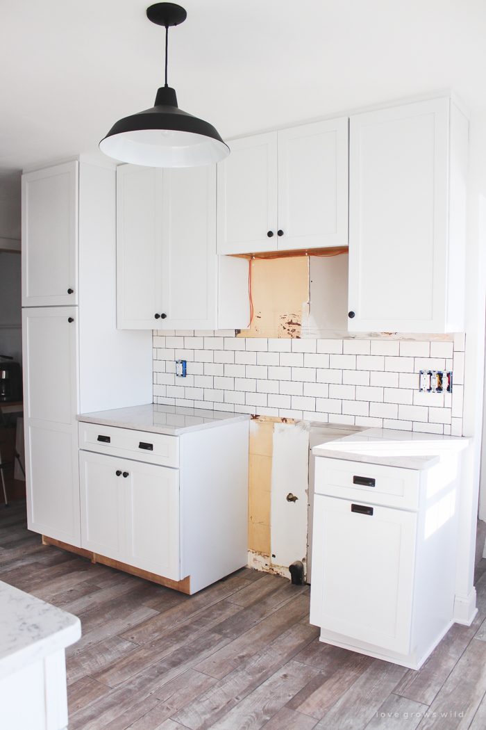 Follow along the makeover of this beautiful farmhouse kitchen! In this post, Liz shares the backsplash she chose and why. Click for more photos and details!