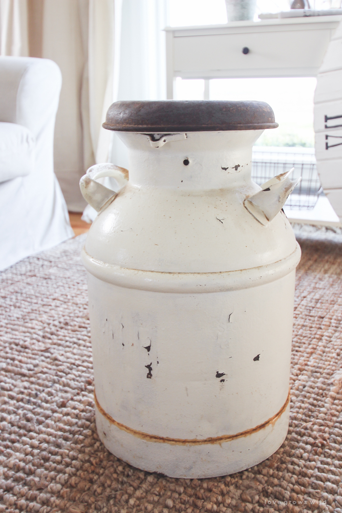 How to turn an old milk can into a gorgeous coffee table! See how this blogger created a unique piece of furniture perfect for her farmhouse at LoveGrowsWild.com 