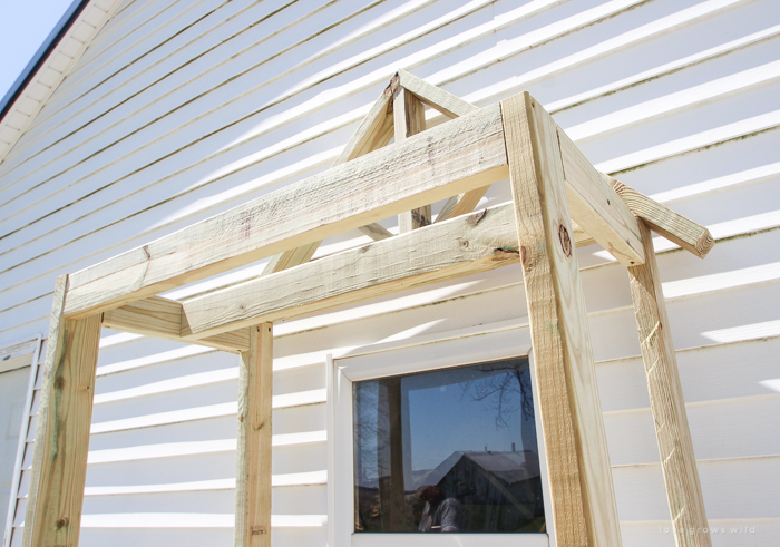 This stunning DIY potting bench is full of charm and perfect for a deck or patio! Use it to hold pots and gardening tools or as a beverage cart when entertaining guests! Full how-to at LoveGrowsWild.com