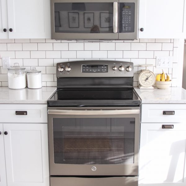 Follow along the makeover of this beautiful farmhouse kitchen! In this post, Liz shares the appliances she picked and why. Click for more photos and details!