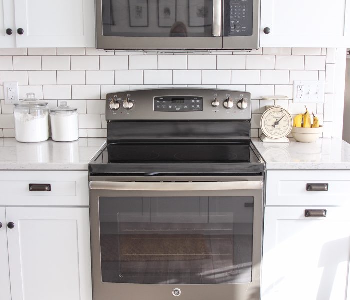 Follow along the makeover of this beautiful farmhouse kitchen! In this post, Liz shares the appliances she picked and why. Click for more photos and details!