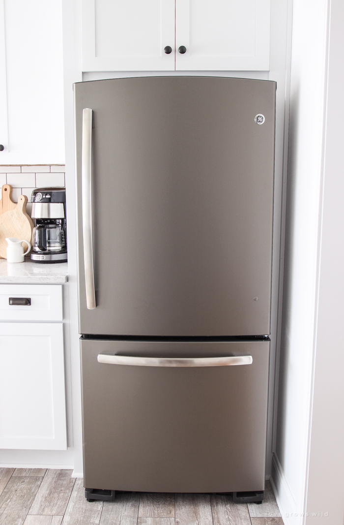 Follow along the makeover of this beautiful farmhouse kitchen! In this post, Liz shares the appliances she picked and why. Click for more photos and details!