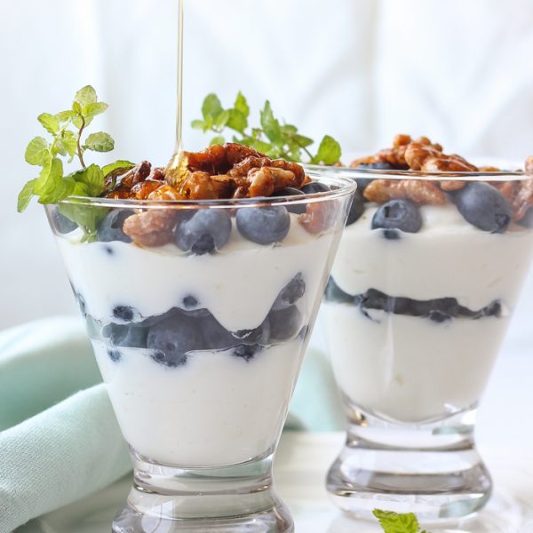 Lemon-infused Greek yogurt topped with fresh blueberries and toasted honey-glazed walnuts makes the perfect healthy breakfast for busy mornings!