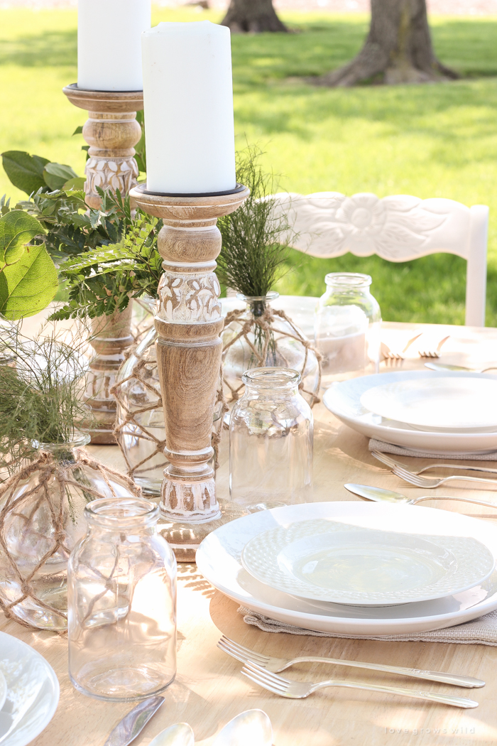 Learn how to create the perfect outdoor table setting with shopping and decorating tips from Liz Fourez. This view of her farm is stunning!