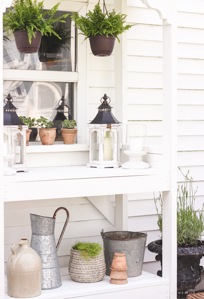 A boring, bare patio turned into a gorgeous outdoor entertaining area! See the incredible before and after of this beautiful patio makeover! 