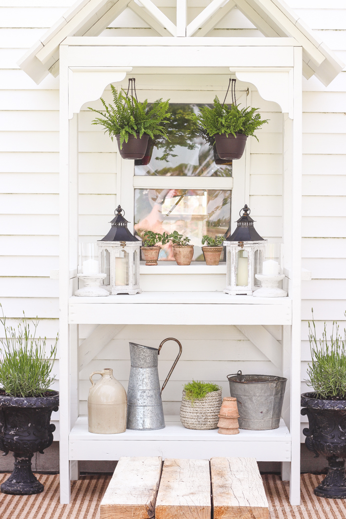 A boring, bare patio turned into a gorgeous outdoor entertaining area! See the incredible before and after of this beautiful patio makeover! 