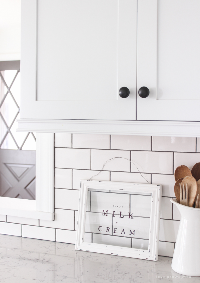 Follow along the makeover of this beautiful farmhouse kitchen! In this post, Liz shares all the finishing touches she picked for lighting, faucets, furniture, and more!