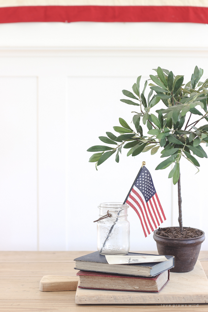 Simple touches of red, white and blue give this farmhouse dining room the perfect patriotic feel. 