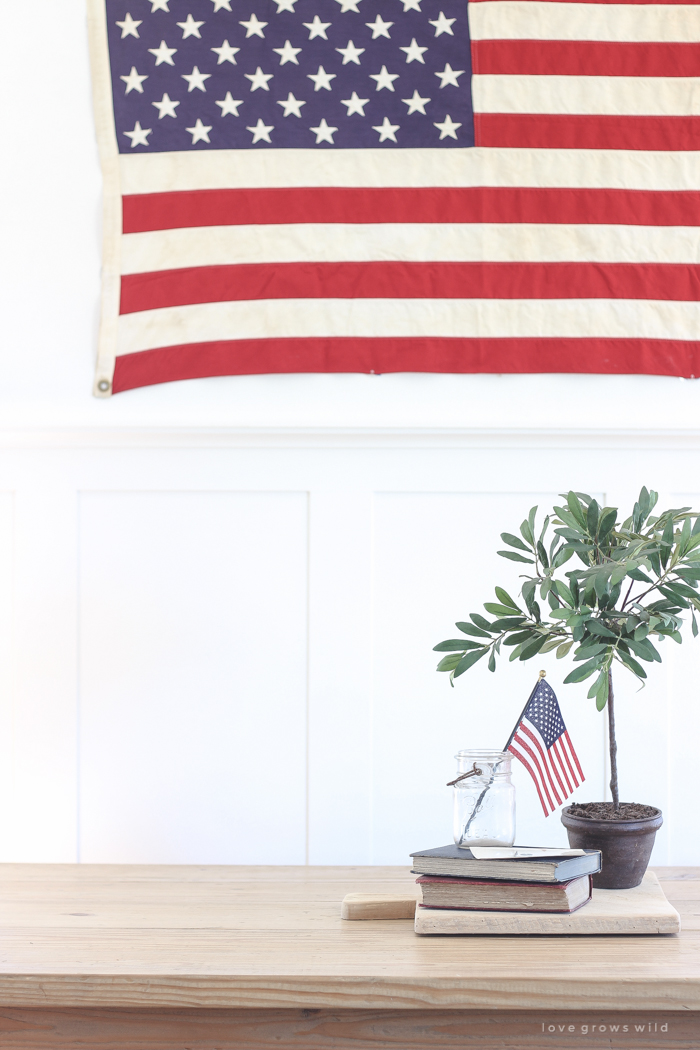 Simple touches of red, white and blue give this farmhouse dining room the perfect patriotic feel. 