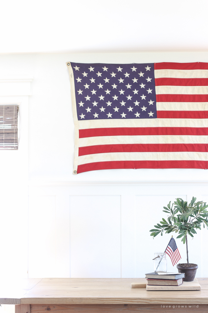 Simple touches of red, white and blue give this farmhouse dining room the perfect patriotic feel. 