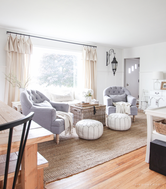 Check out this beautifully decorated farmhouse-style living and dining room!