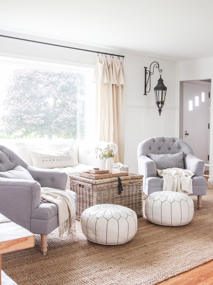 Check out this beautifully decorated farmhouse-style living and dining room!