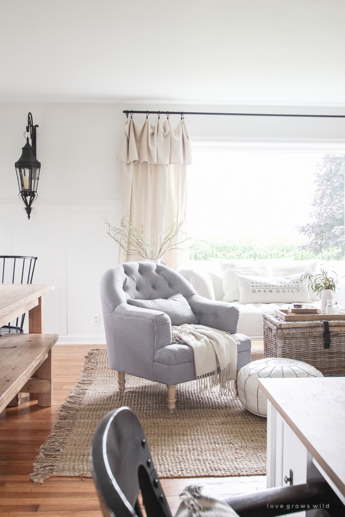 Check out this beautifully decorated farmhouse-style living and dining room!