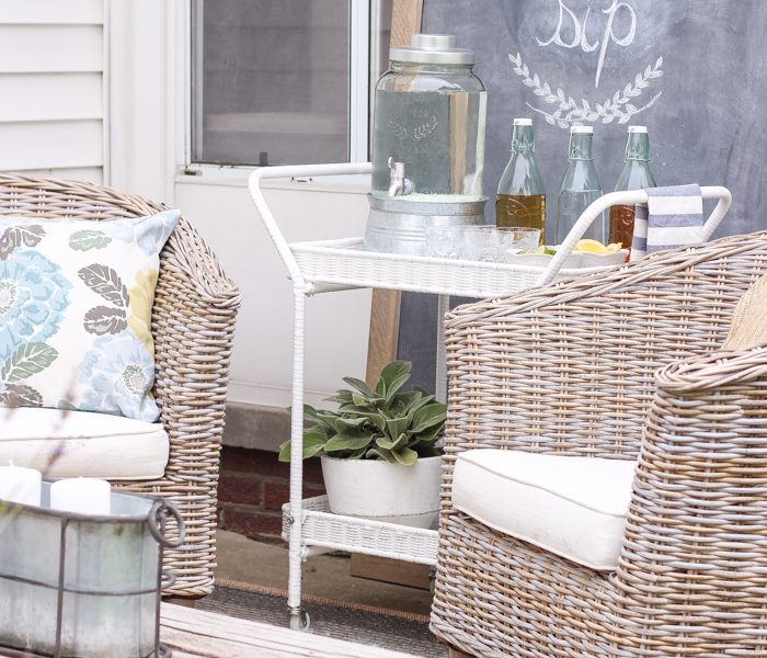 This gorgeous patio is perfect for summer entertaining! Learn how to create a simple, yet stunning outdoor bar cart for your next party!