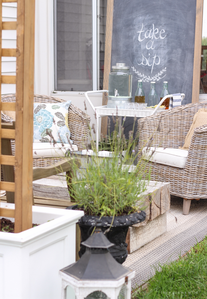 This gorgeous patio is perfect for summer entertaining! Learn how to create a simple, yet stunning outdoor bar cart for your next party!