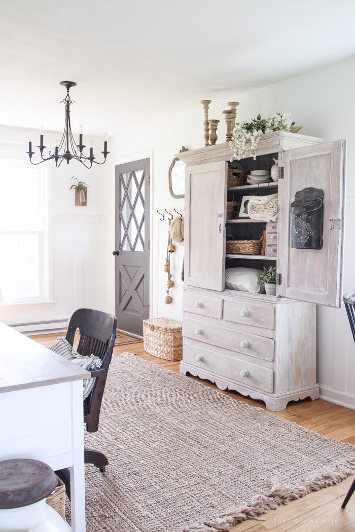 Step inside this beautiful Indiana farmhouse entryway decorated with a mix of timeworn antiques and unique DIY projects!