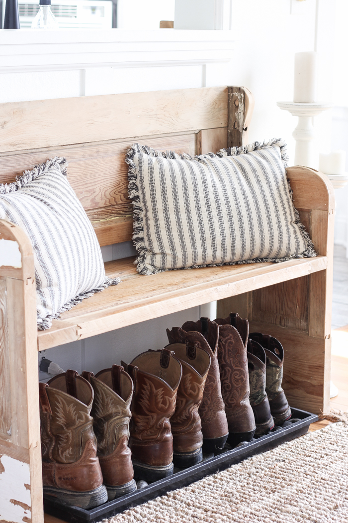 Step inside this beautiful Indiana farmhouse entryway decorated with a mix of timeworn antiques and unique DIY projects!