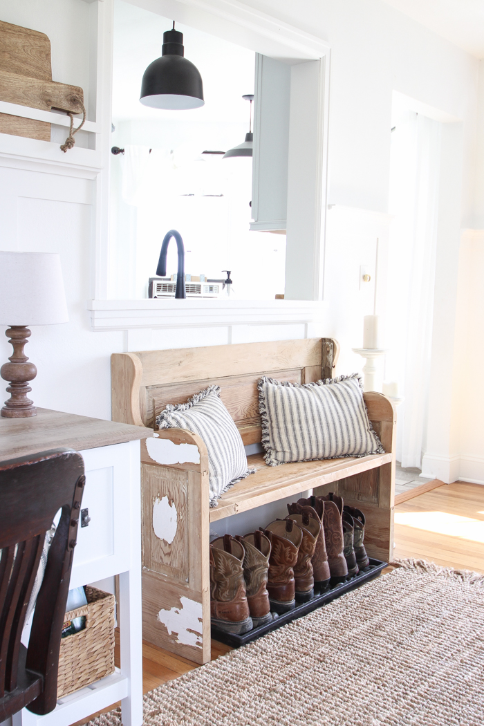 Step inside this beautiful Indiana farmhouse entryway decorated with a mix of timeworn antiques and unique DIY projects!