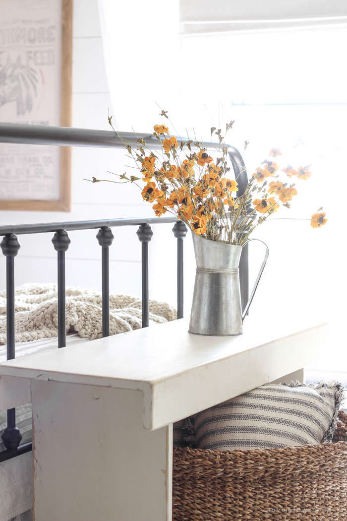 A beautiful farmhouse bedroom decorated with simple touches of fall!