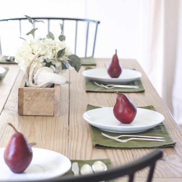 A beautiful farmhouse table setting decorated with simple touches of fall!
