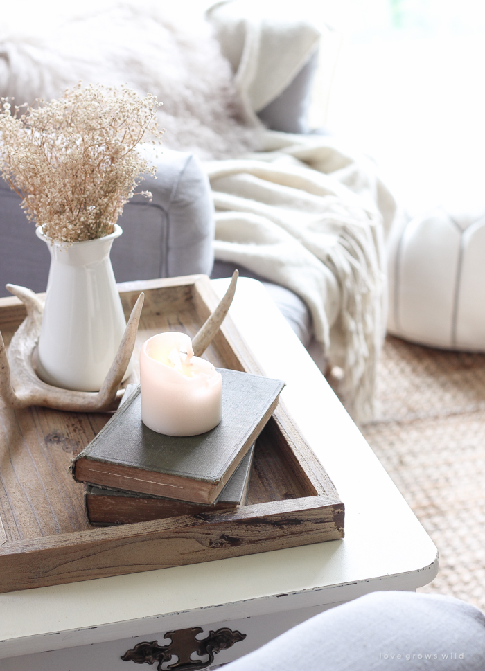 A beautiful farmhouse living room decorated with simple touches of fall!