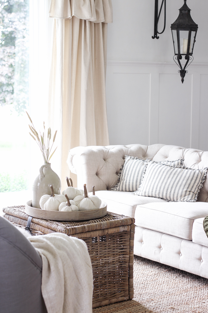 A beautiful farmhouse living room decorated with simple touches of fall!