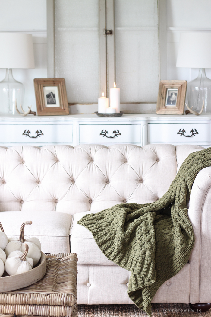 A beautiful farmhouse living room decorated with simple touches of fall!