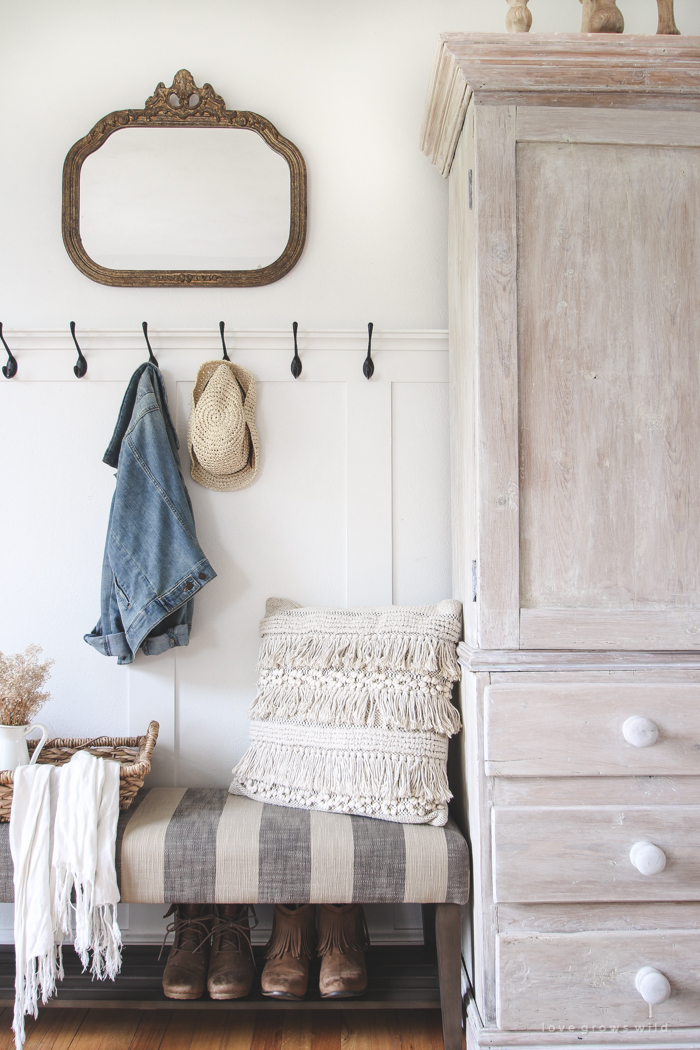 Entry door bench with outlet hooks