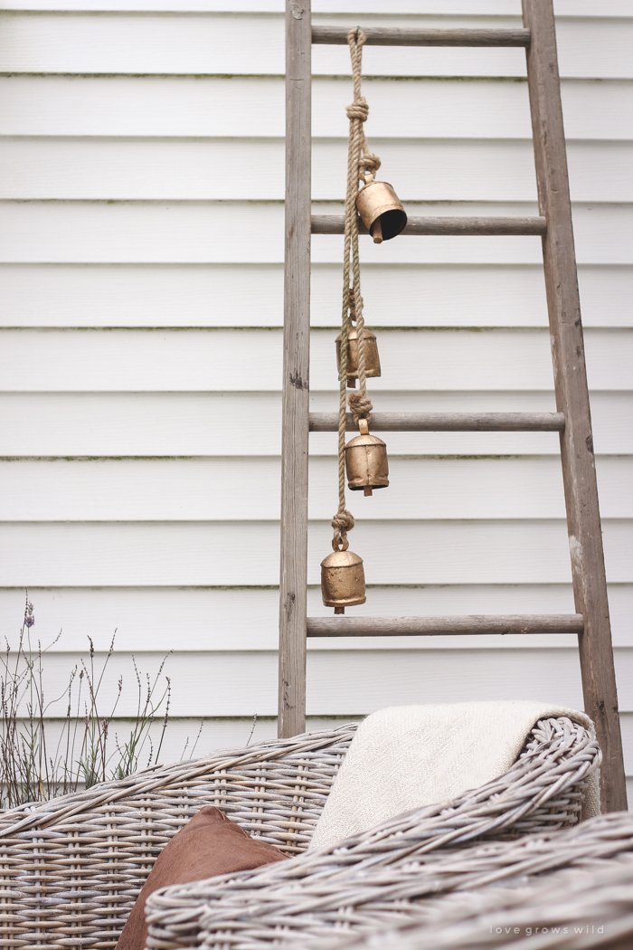 A small patio is transformed into a cozy seating area for fall. 