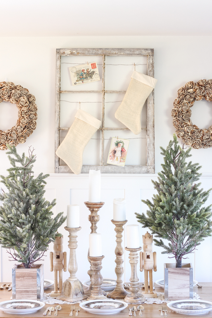 A beautiful farmhouse table decorated for the holidays!