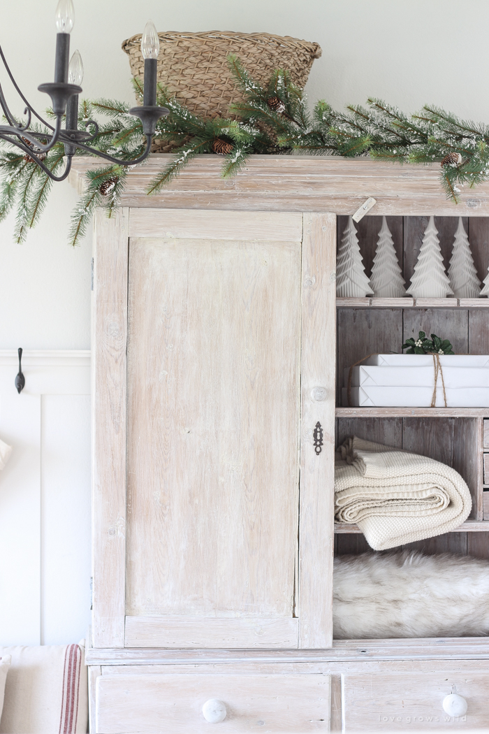 A beautiful farmhouse entryway decorated for the holidays!