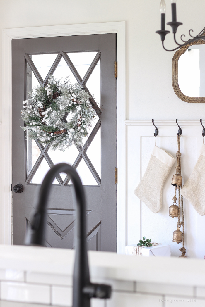 A beautiful farmhouse entryway decorated for the holidays!