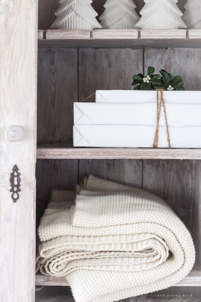 A beautiful farmhouse entryway decorated for the holidays!