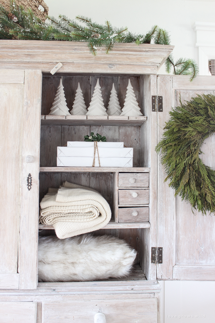 A beautiful farmhouse entryway decorated for the holidays!