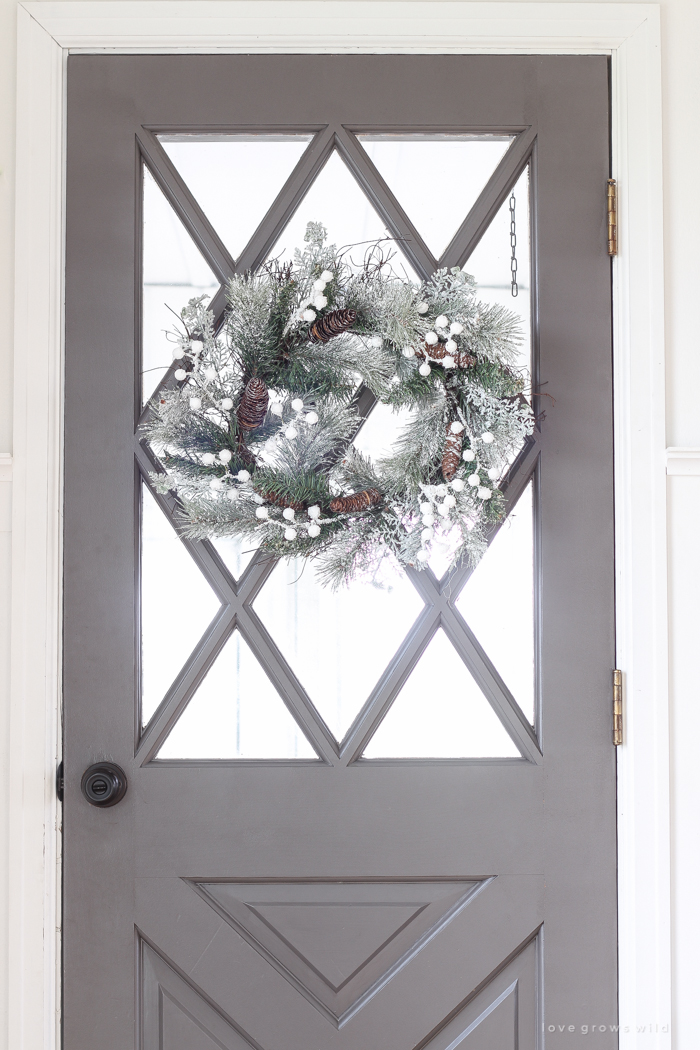 A beautiful farmhouse entryway decorated for the holidays!