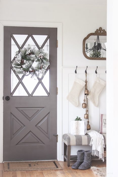 A beautiful farmhouse entryway decorated for the holidays!