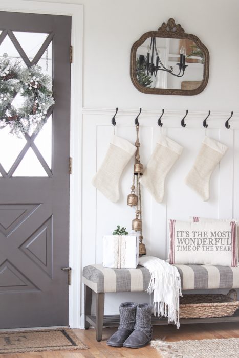 A beautiful farmhouse entryway decorated for the holidays!
