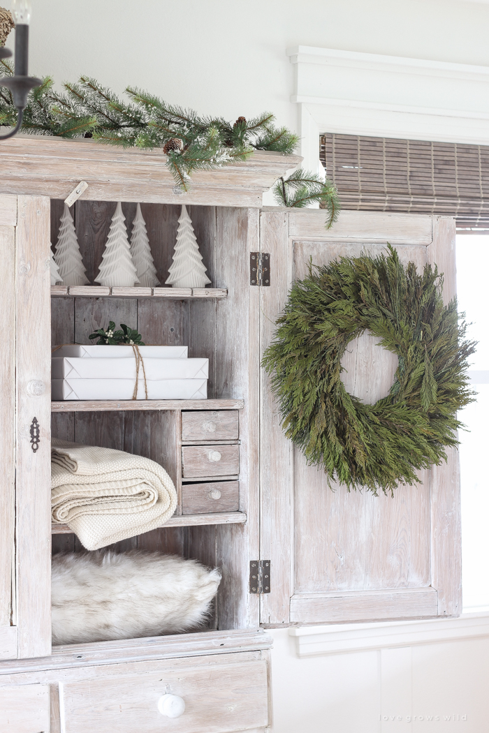 A beautiful farmhouse entryway decorated for the holidays!