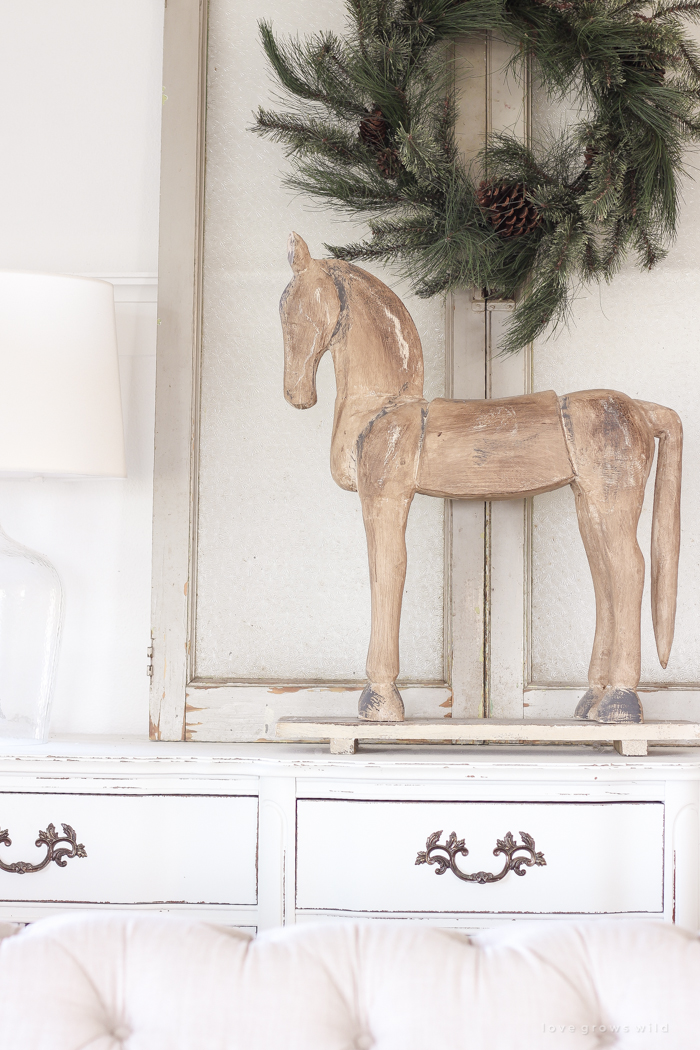 A beautiful farmhouse living room decorated for the holidays!