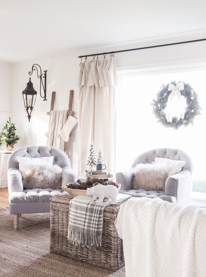 A beautiful farmhouse living room decorated for the holidays!