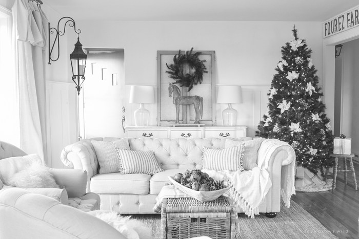 A beautiful farmhouse living room decorated for the holidays!