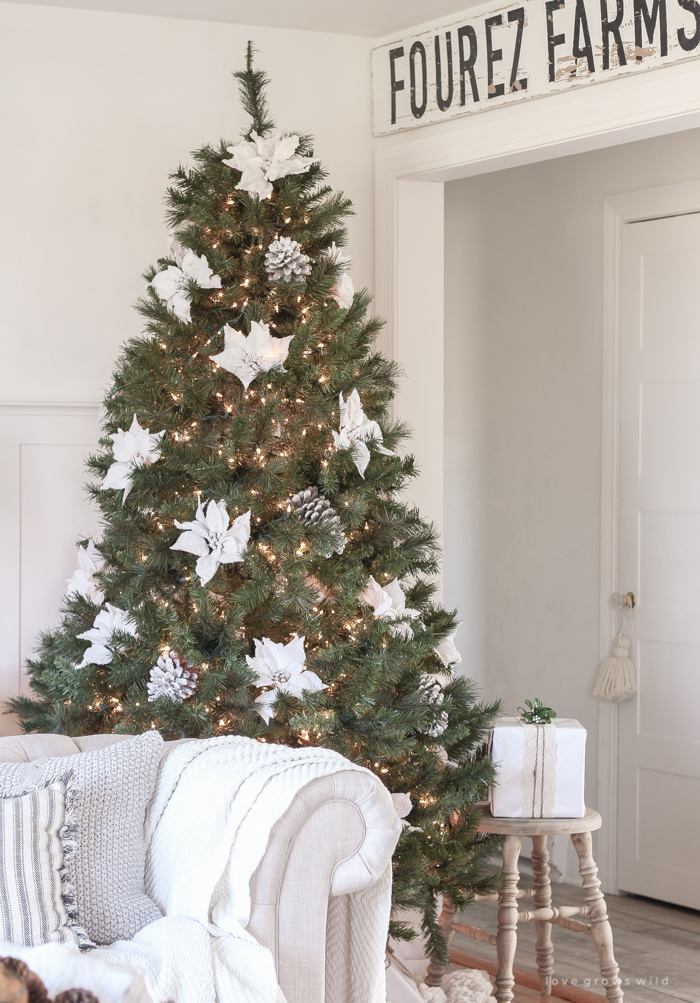 A beautiful farmhouse living room decorated for the holidays!