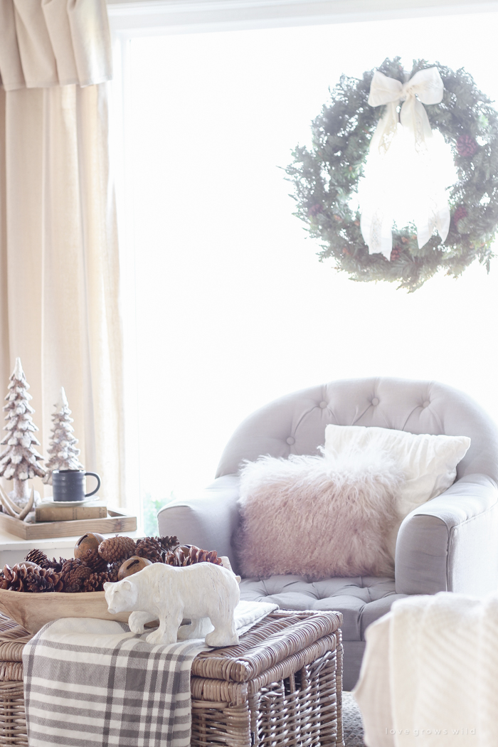 A beautiful farmhouse living room decorated for the holidays!