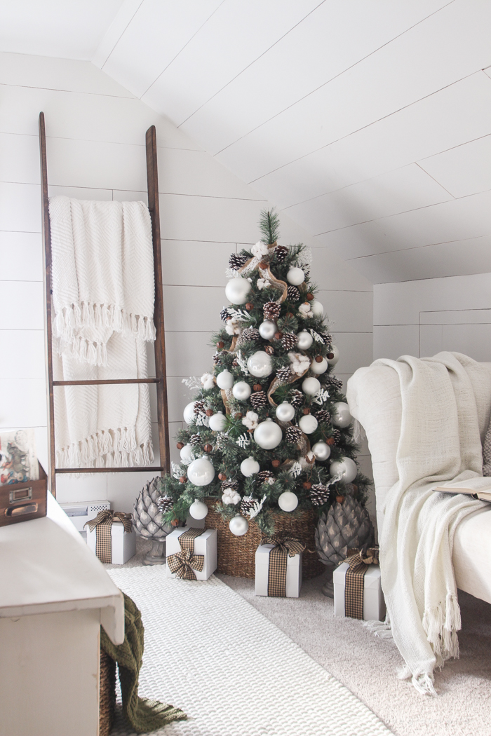 A beautiful farmhouse bedroom decorated for the holidays!