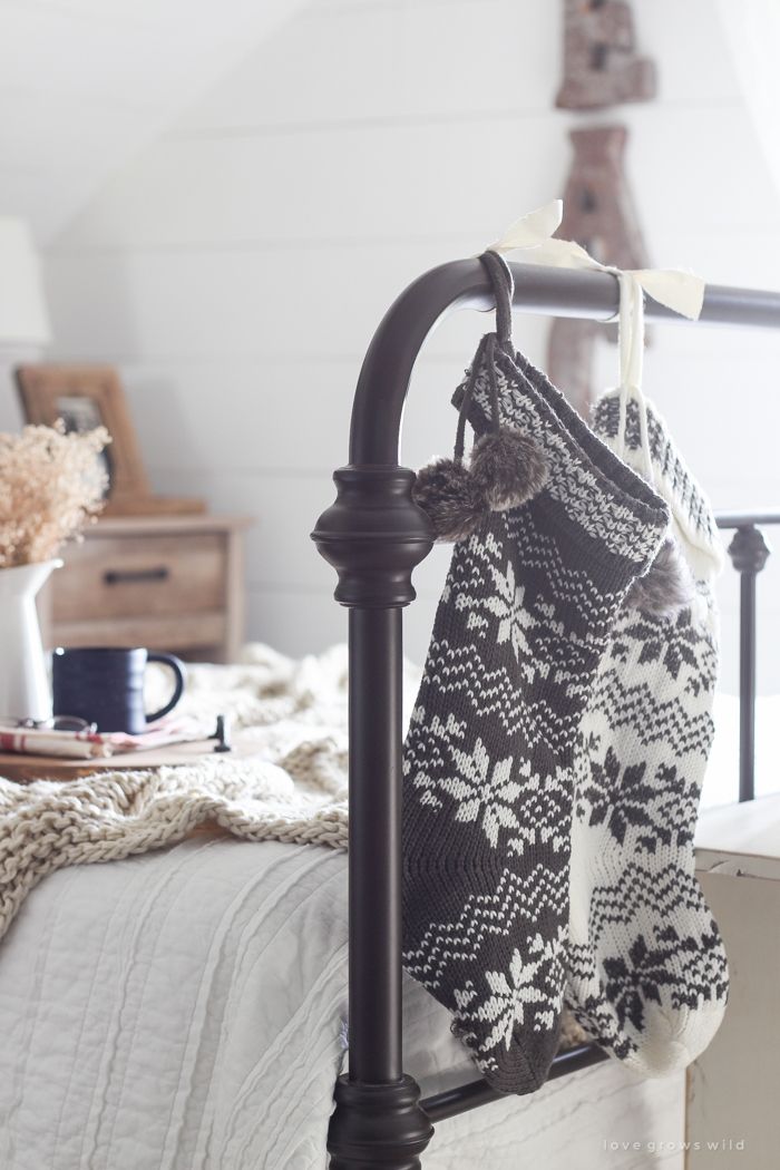 A beautiful farmhouse bedroom decorated for the holidays!