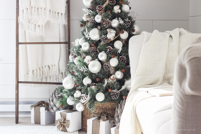 A beautiful farmhouse bedroom decorated for the holidays!
